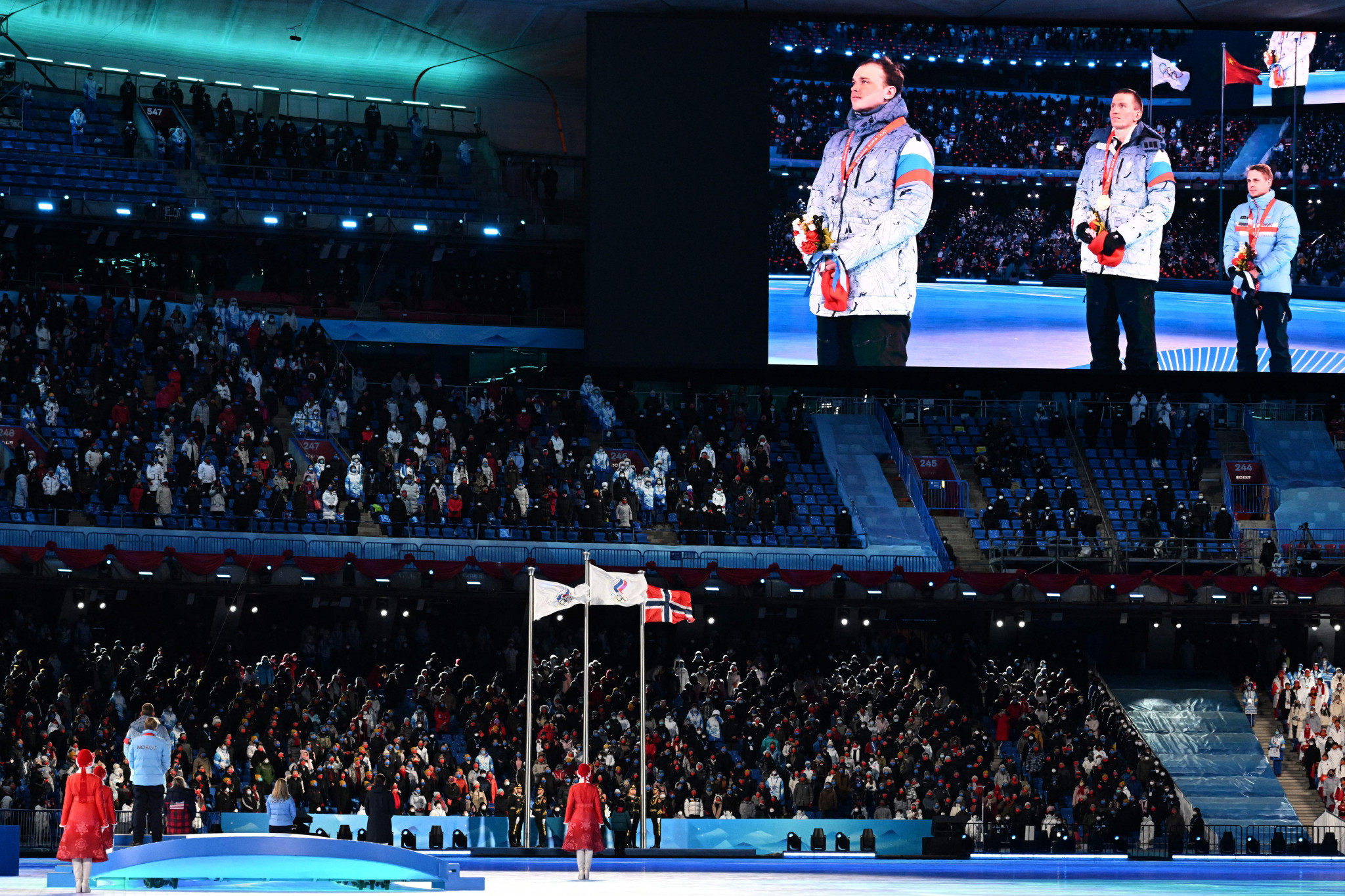 Alexander Bolshunov received the final gold medal of Beijing 2022 as the flag of the Russian Olympic Committee was raised at the Bird's Nest - a few days later his country invaded Ukraine, with him as one of the war's most high-profile supporters ©Getty Images
