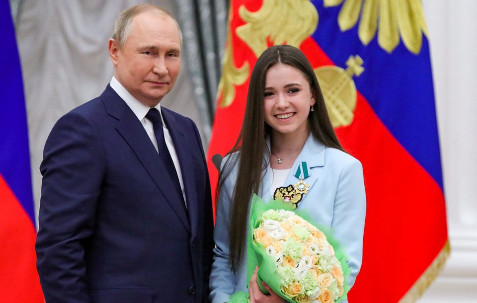 Russian President Vladimir Putin, left, honoured Kamila Valieva during a televised ceremony at the Kremlin last year, which coincided with the skater celebrating her 16th birthday ©The Kremlin