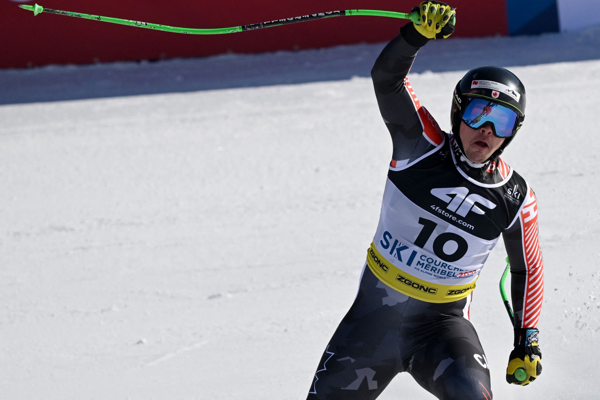 James Crawford punches the air after securing the quickest super-G time to clinch gold ©Getty Images