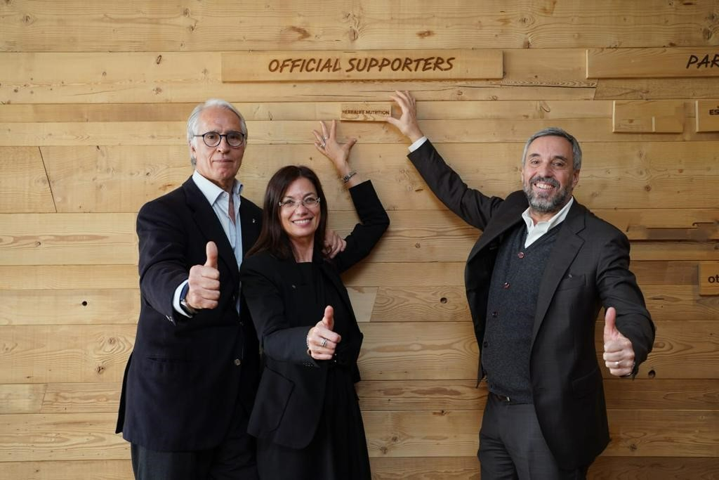 Giovanni Malagò, President of the Milan Cortina 2026 Foundation, left, Rebecca Varoli Piazza, country director of Herbalife Nutrition Italia, centre, and Andrea Varnier, chief executive of the Milan Cortina 2026 Foundation announce a new sponsorship deal for the Games ©Milan Cortina 2026