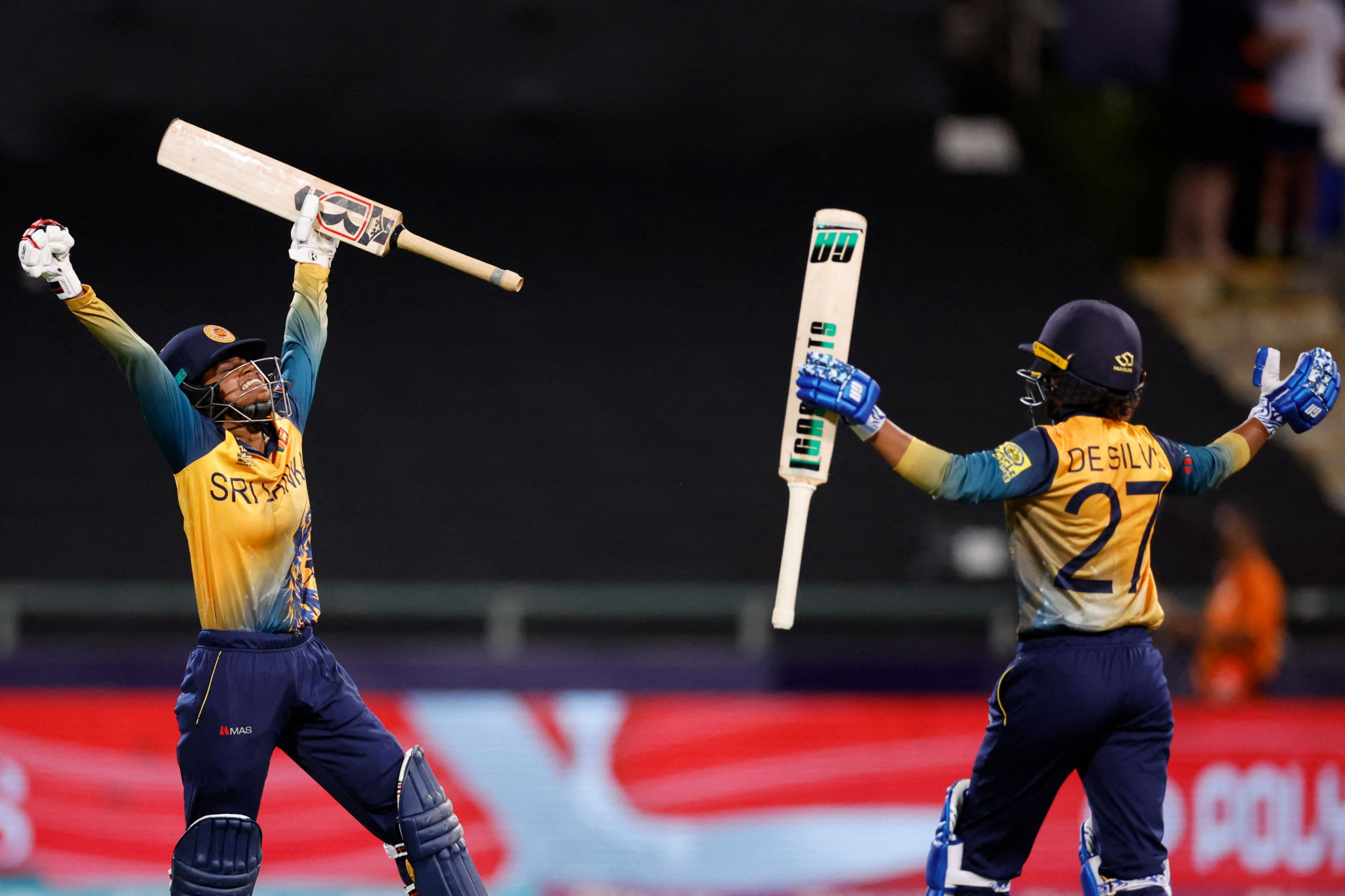 Sri Lanka batters celebrate Harshitha Madavi and Nilakshi de Silva after putting on a partnership of 104 to secure victory against Bangladesh ©Getty Images