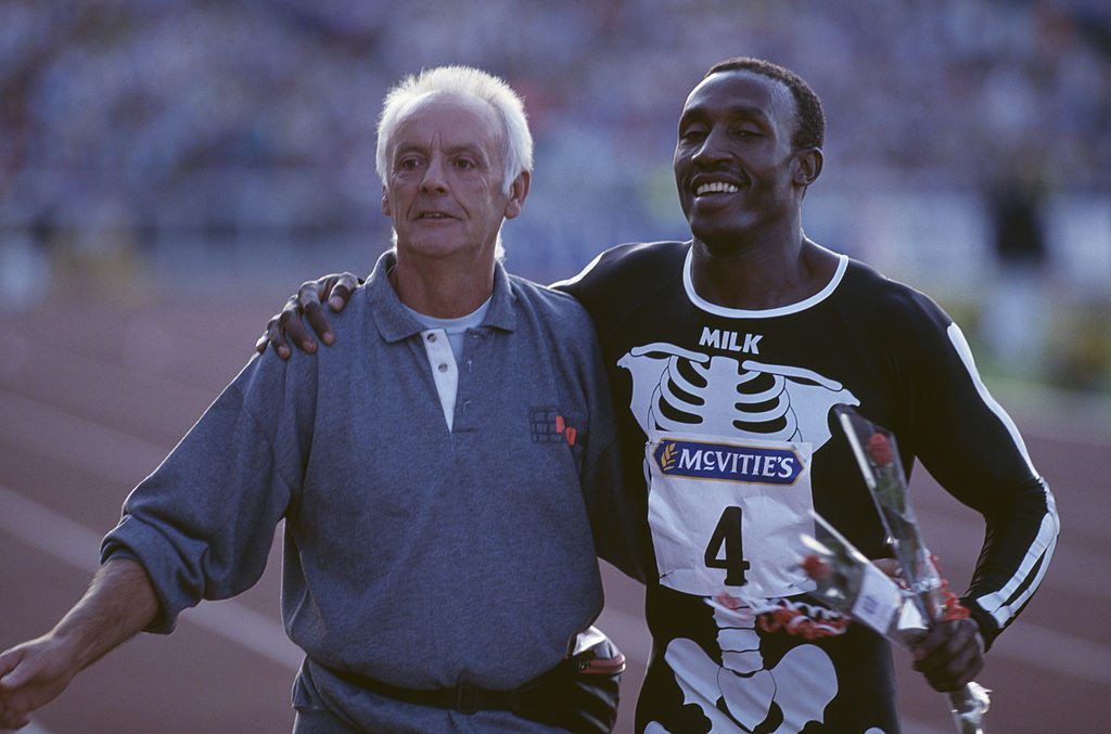 Athletics coach Ron Roddan, pictured with Linford Christie in 1991, has died aged 91 ©Getty Images