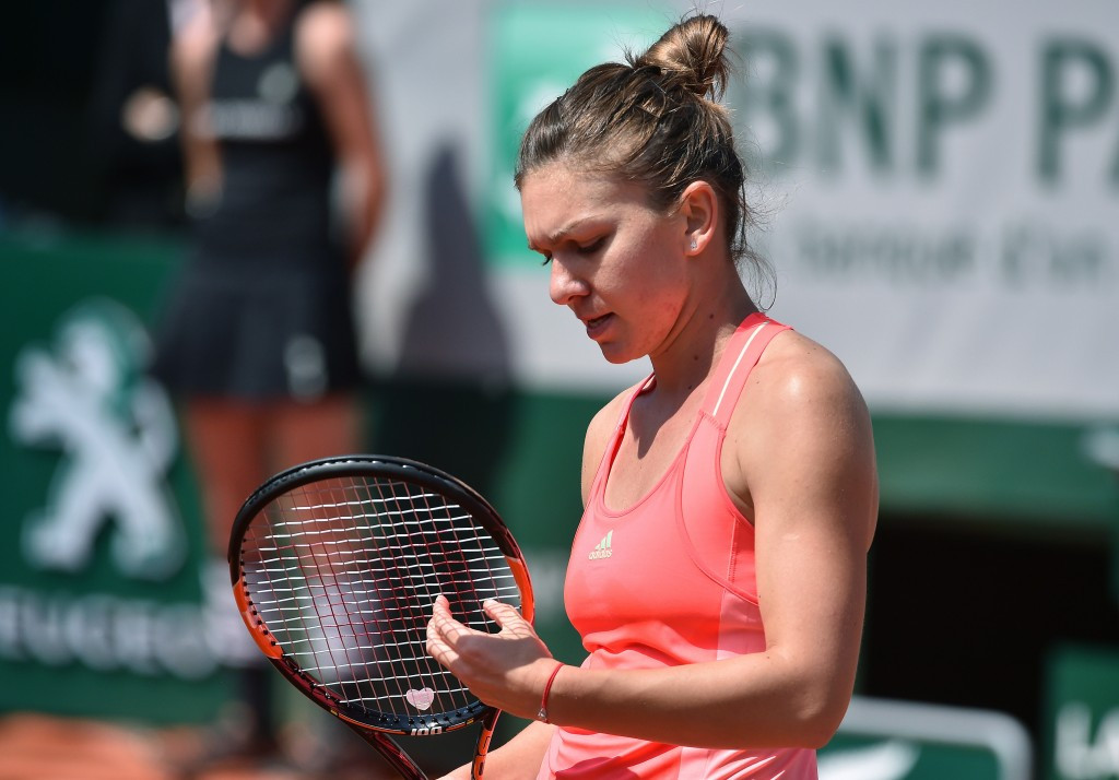 Last year's runner-up Simona Halep is out after suffering a shock defeat to Croatia's Mirjana Lucic-Baroni