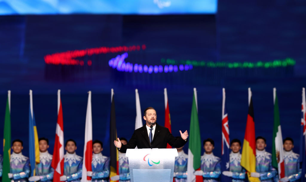 International Paralympic Committee President Andrew Parsons speaks at the Beijing 2022 Winter Paralympics, from which Russian and Belarusian athletes were banned following a threat of widespread boycotts ©Getty Images