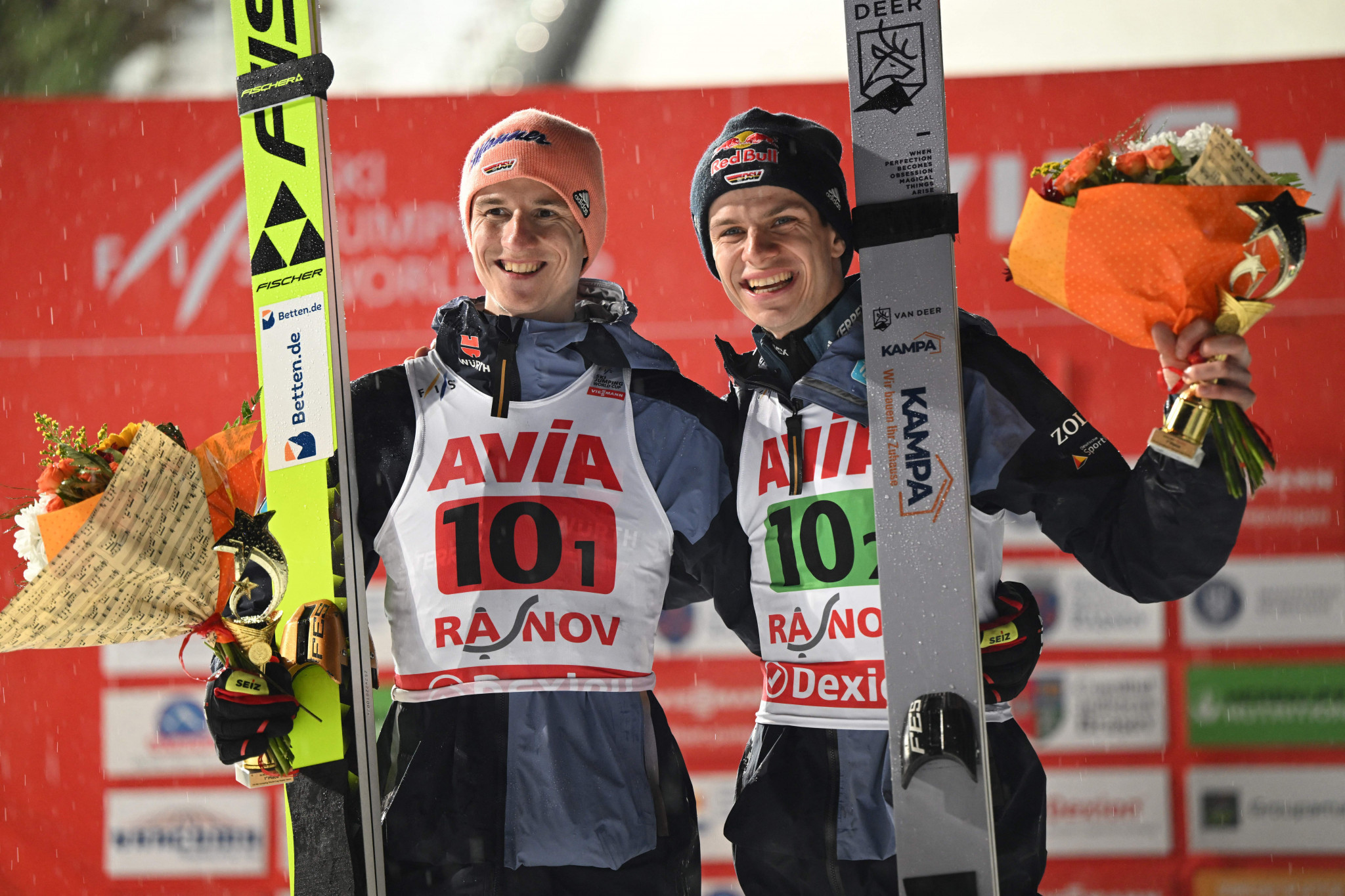 Geiger and Wellinger combat heavy rain to take FIS Ski Jumping World Cup win