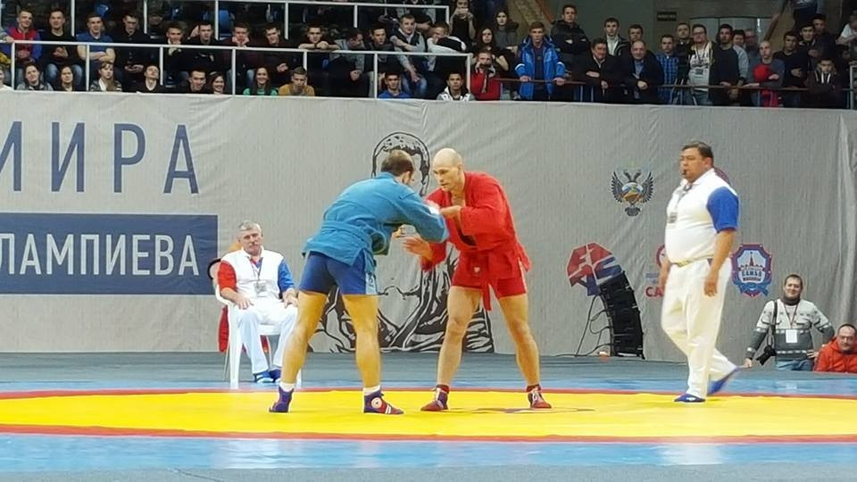 Russia's Andrey Perepelyuk (red) triumphed in the men's 82kg category