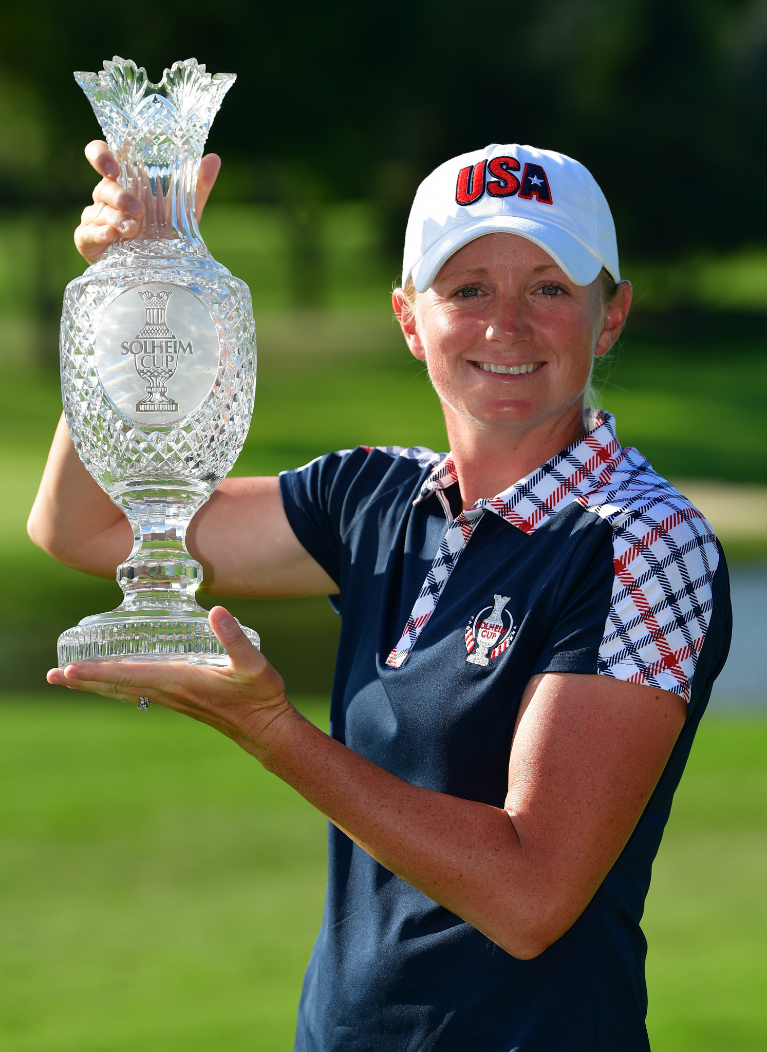 Stacy Lewis pictured with the Solheim Cup trophy in 2017 ©Getty Images