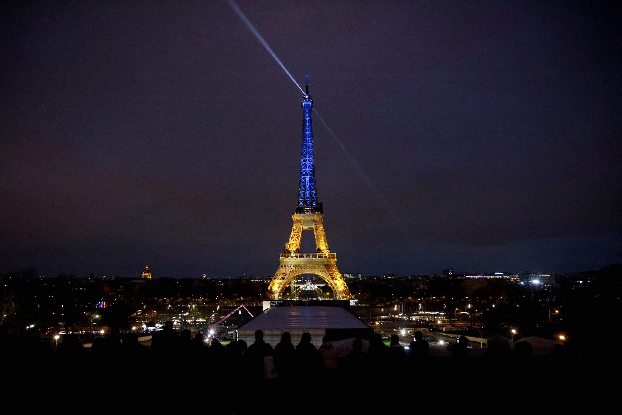 The Eiffel Tower in Paris was lit up in the blue and yellow of Ukraine's flag to mark the one-year anniversary of Russia's invasion ©Getty Images