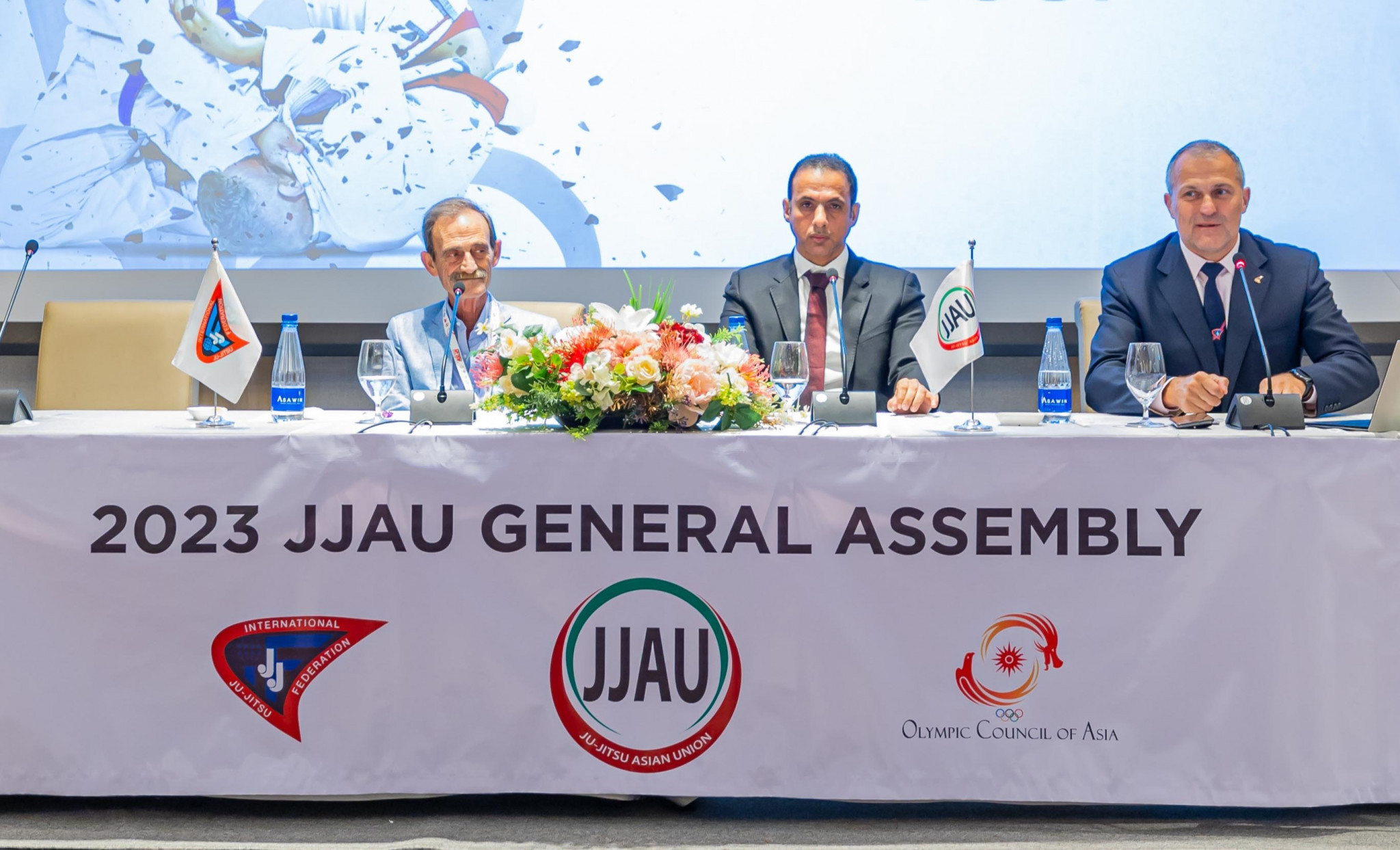 JJAU general secretary Fahad Al Shamsi, centre, has called for hosting applications for the Asian Youth Championships ©JJAU