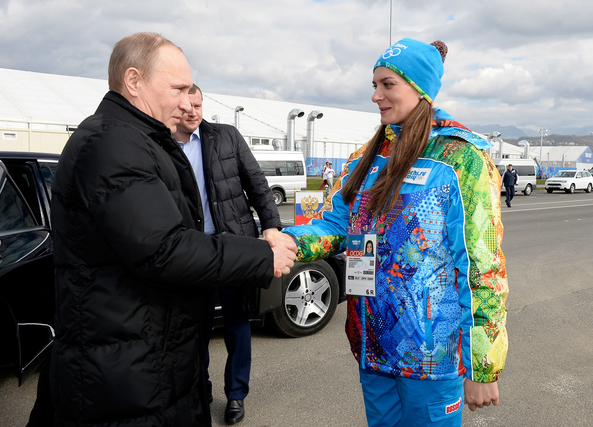Yelena Isinbayeva, right, pictured with Russian President Vladimir Putin in 2014, has been sanctioned by the Ukrainian Government ©Getty Images