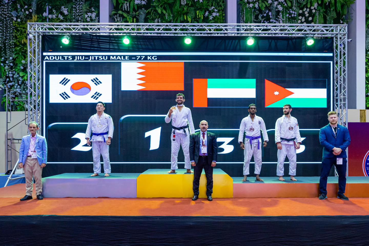 Ali Munfaredi's, centre, triumph was Bahrain's first gold medal of the Championships ©JJAU