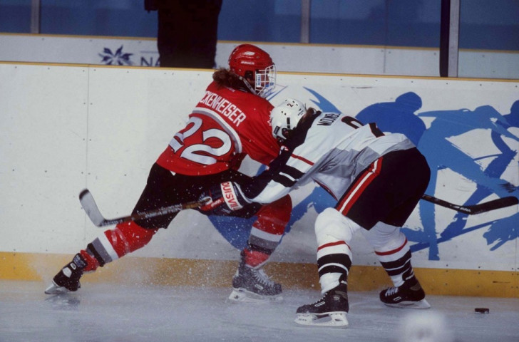 Hayley Wickenheiser mixes it with Tara Mounsey of the United States in the first women's Olympic ice hockey final at the 1998 Nagano Winter Games ©Getty Images