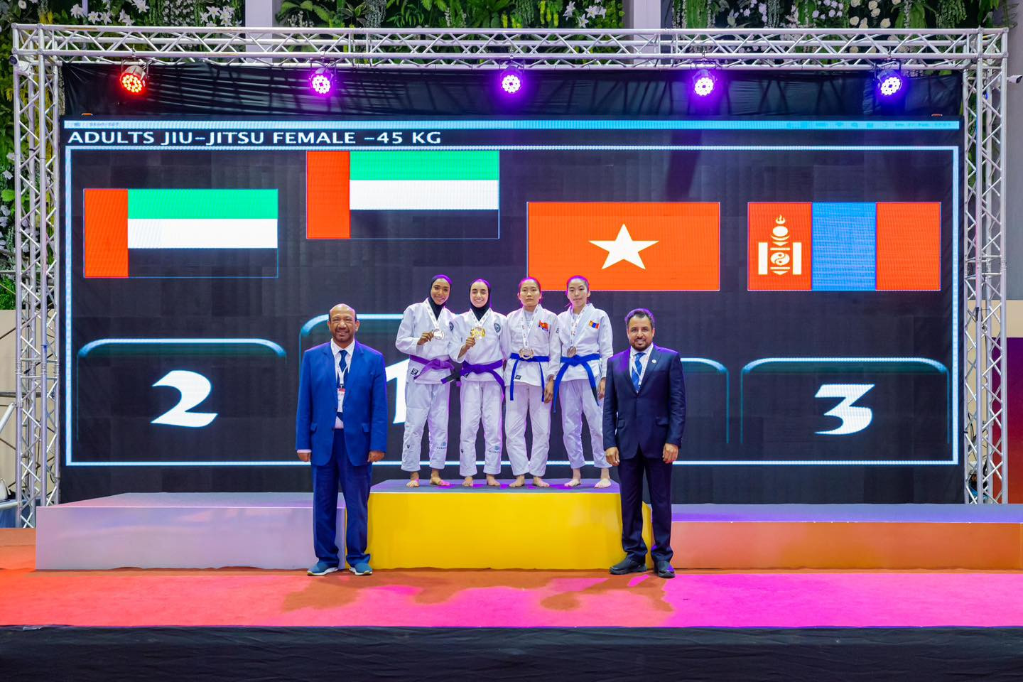 Hamda Al Shkeili, centre, led an Emirati one-two in the first final of the day with victory over Aysha Al Shamsi in the women's under-45-kilograms division ©JJAU