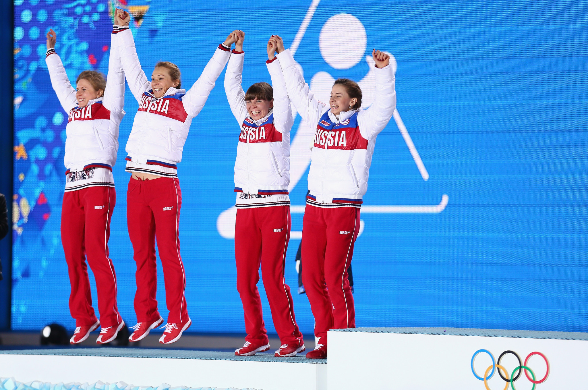 Russia celebrate their Olympic silver medals in the 4x6km women's biathlon at Sochi 2014 but have now been stripped of them due to doping ©Getty Images