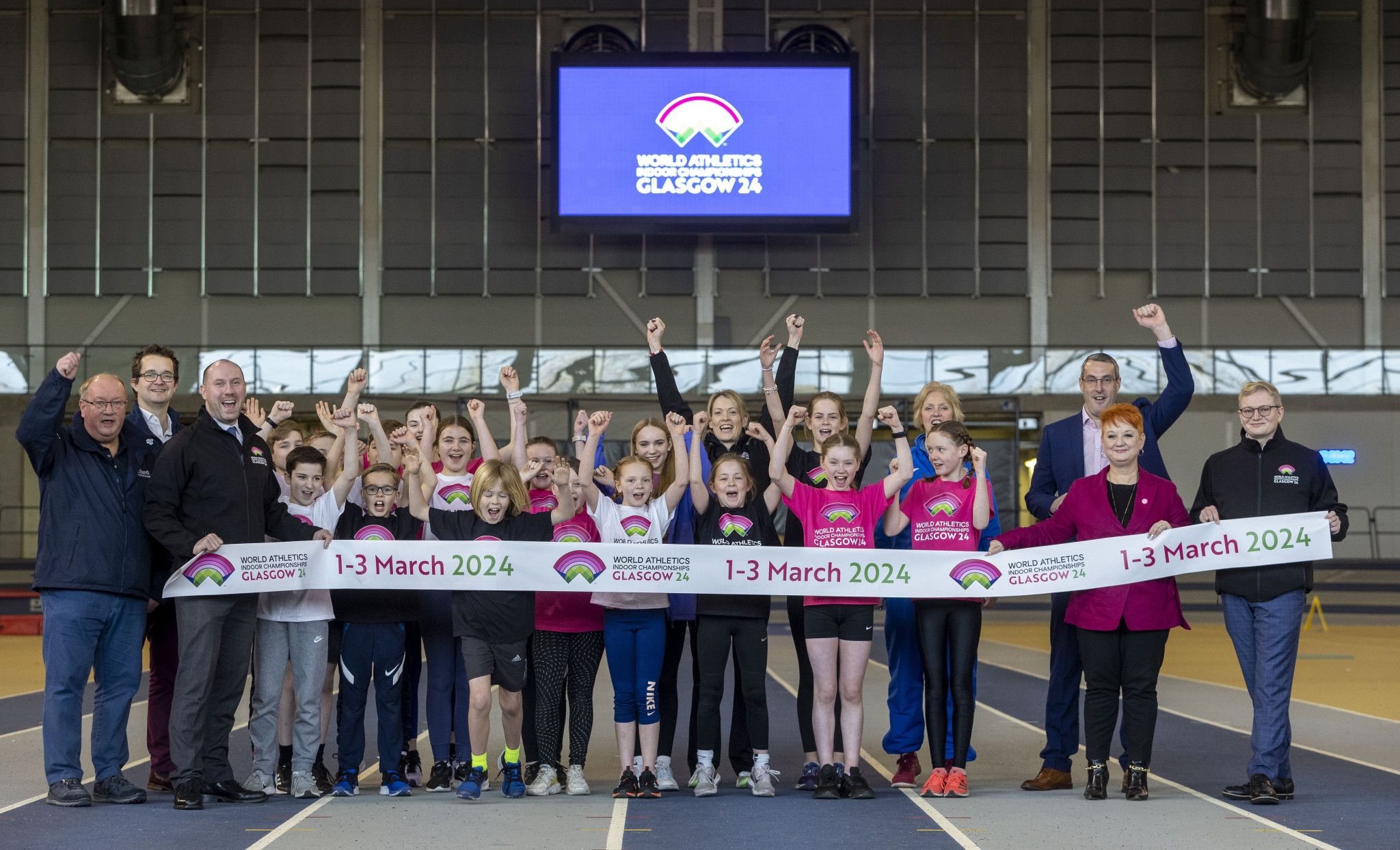 Eilidh Doyle, centre, one of Scotland's most successful athletes, helped launch the year to go celebrations for the 2024 World Athletics Indoor Championships at the the Emirates Arena in Glasgow ©Glasgow 2024