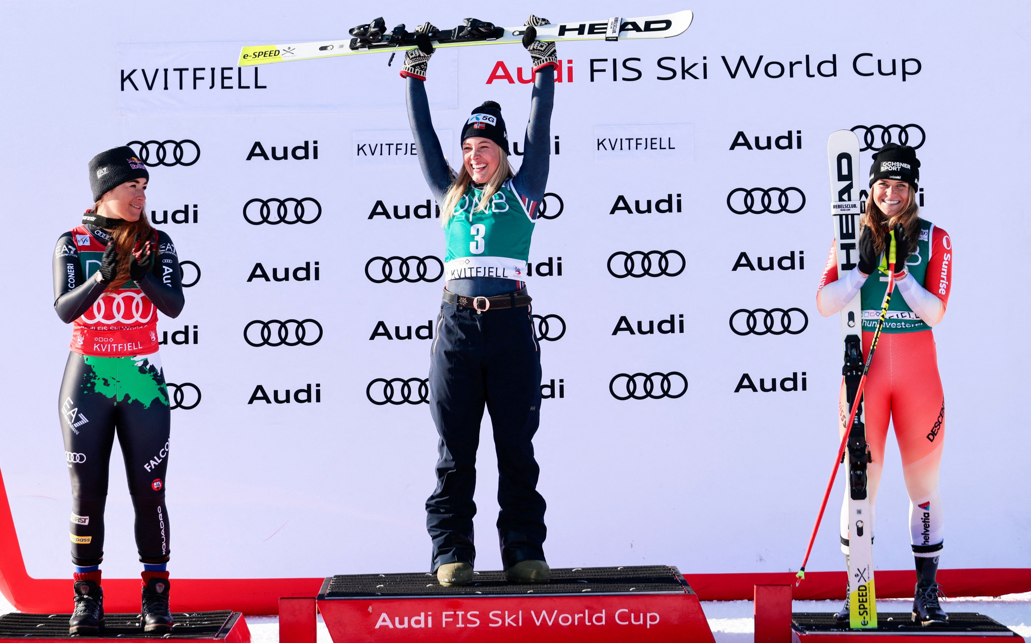 The podium for the Alpine Skiing World Cup downhill event in Kvitfjell, won by Norway's Kajsa Vickhoff Lie, centre 
