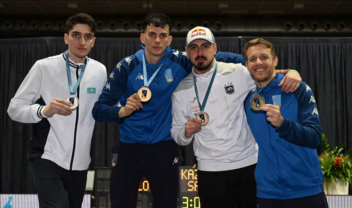 Italy's Michele Gallo, second left, triumphed in the men's sabre FIE World Cup before home fans in Padua ©FIE