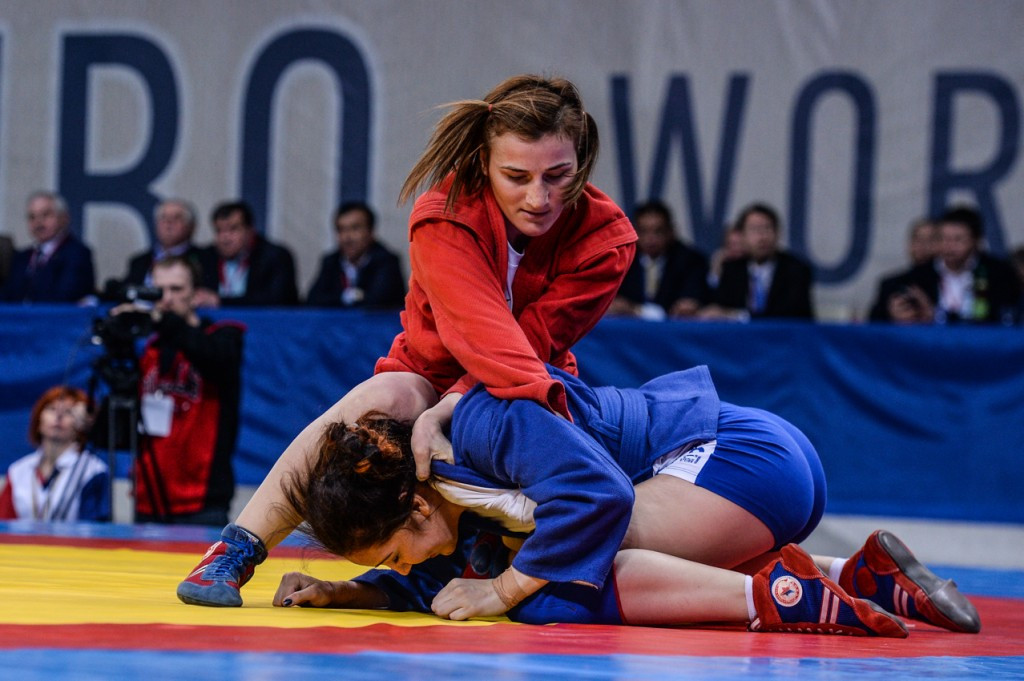 Georgia's Shorena Sharadze (red) was one of only two sambists to prevent Russia winning gold on day one, beating Oksana Lukyanchuk in the women's 60kg final ©FIAS