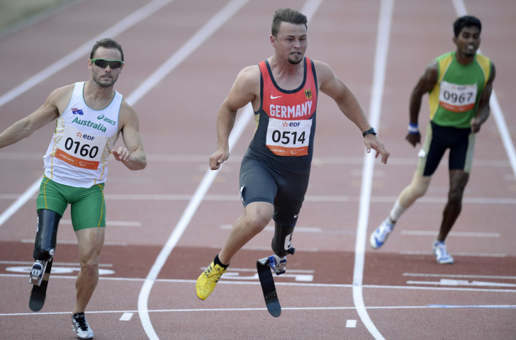 Scott Reardon (left) dead heated with Heinrich Popow (centre) in the 100m T42 event at the 2013 IPC World Athletics Championships