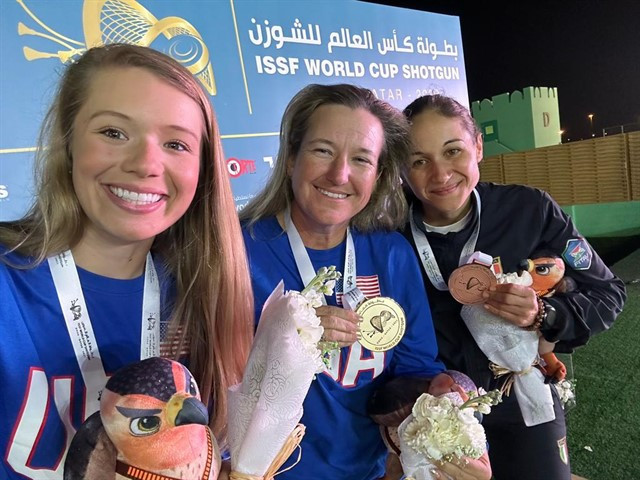 Three-time Olympic champion Kimberly Rhode, centre, won two gold medals in Doha ©ISSF