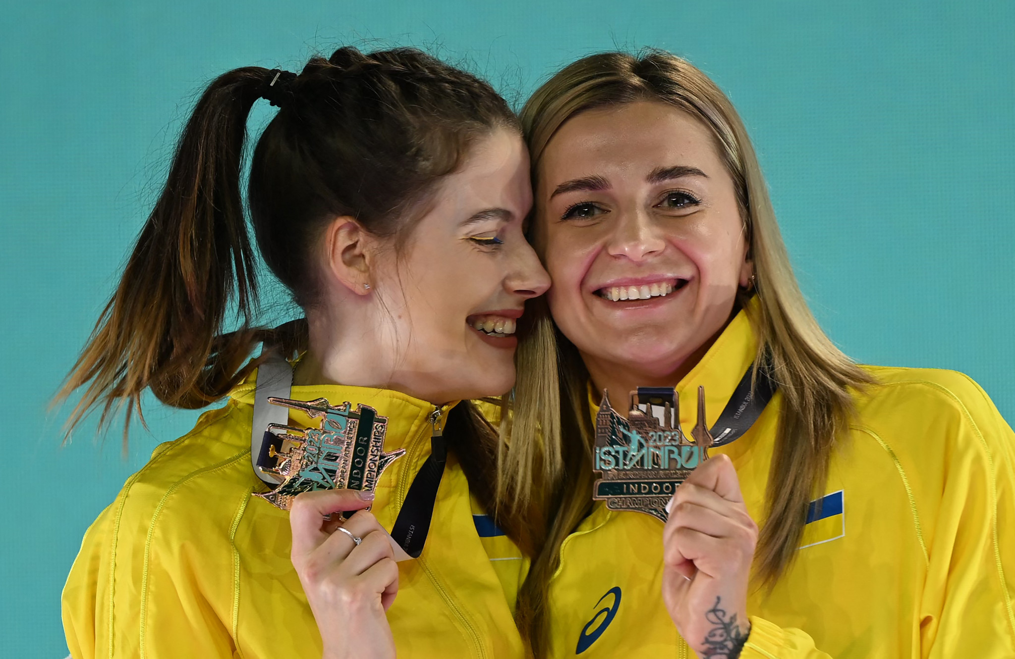 Ukraine's athletes, including Yaroslava Mahuchikh and Kateryna Tabashnyk, gold and bronze medallists in the high jump at this month's European Athletics Indoor Championships, have continued to keep their country's flag flying at international events ©Getty Images