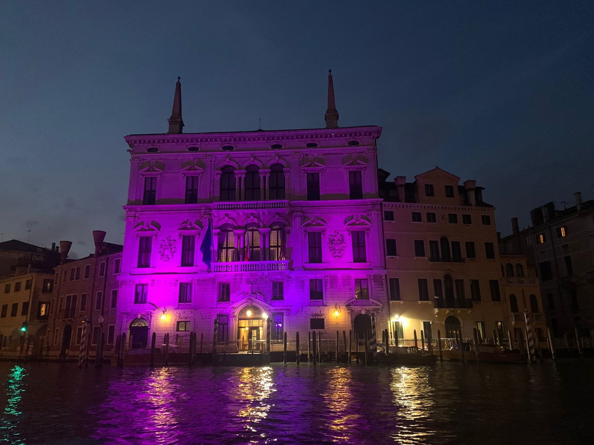 Buildings lit in purple to mark three years to the 2026 Winter Paralympics