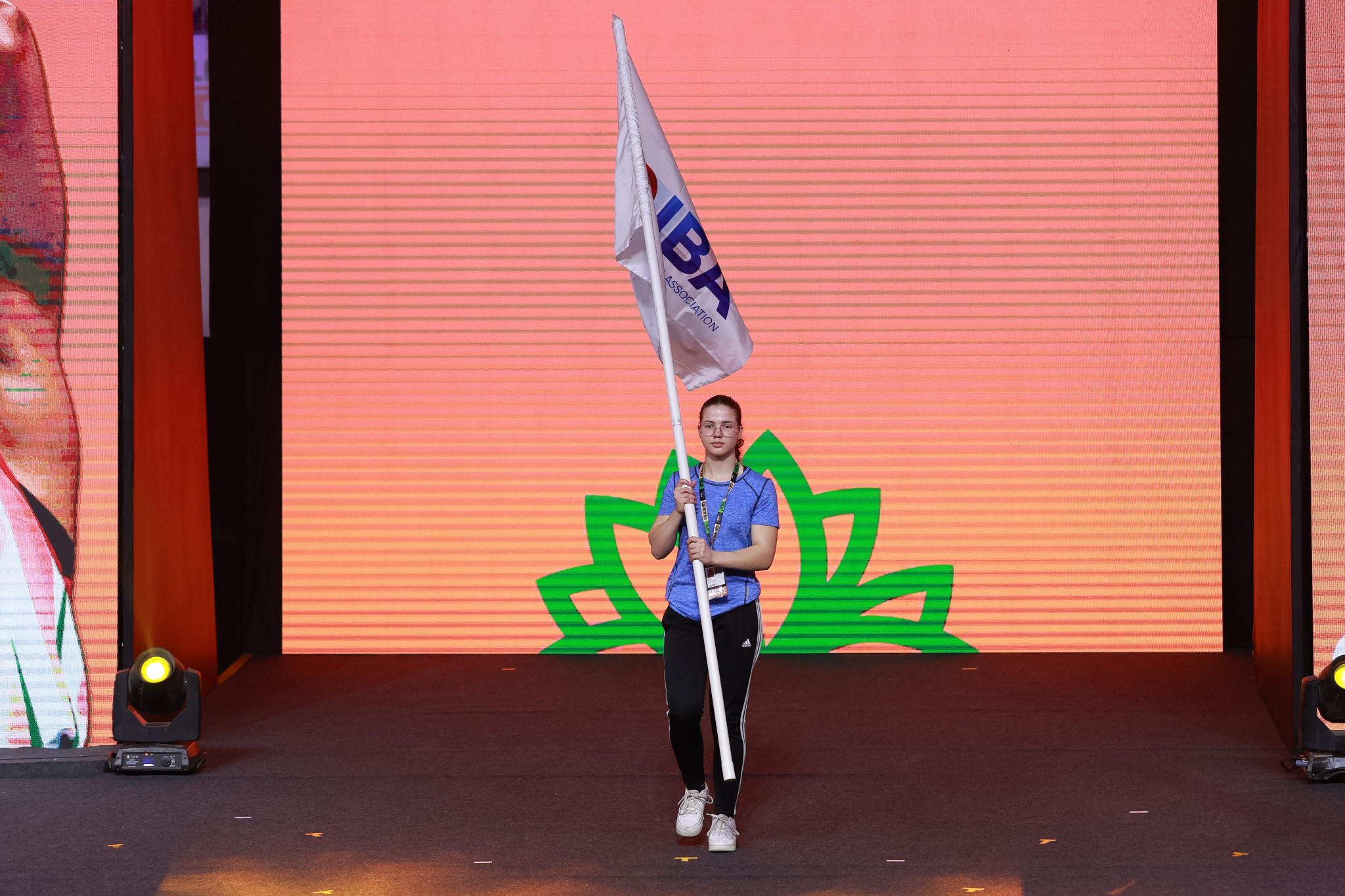 Megan de Cler of The Netherlands carries an IBA flag at the Opening Ceremony of the Women's World Championships ©IBA