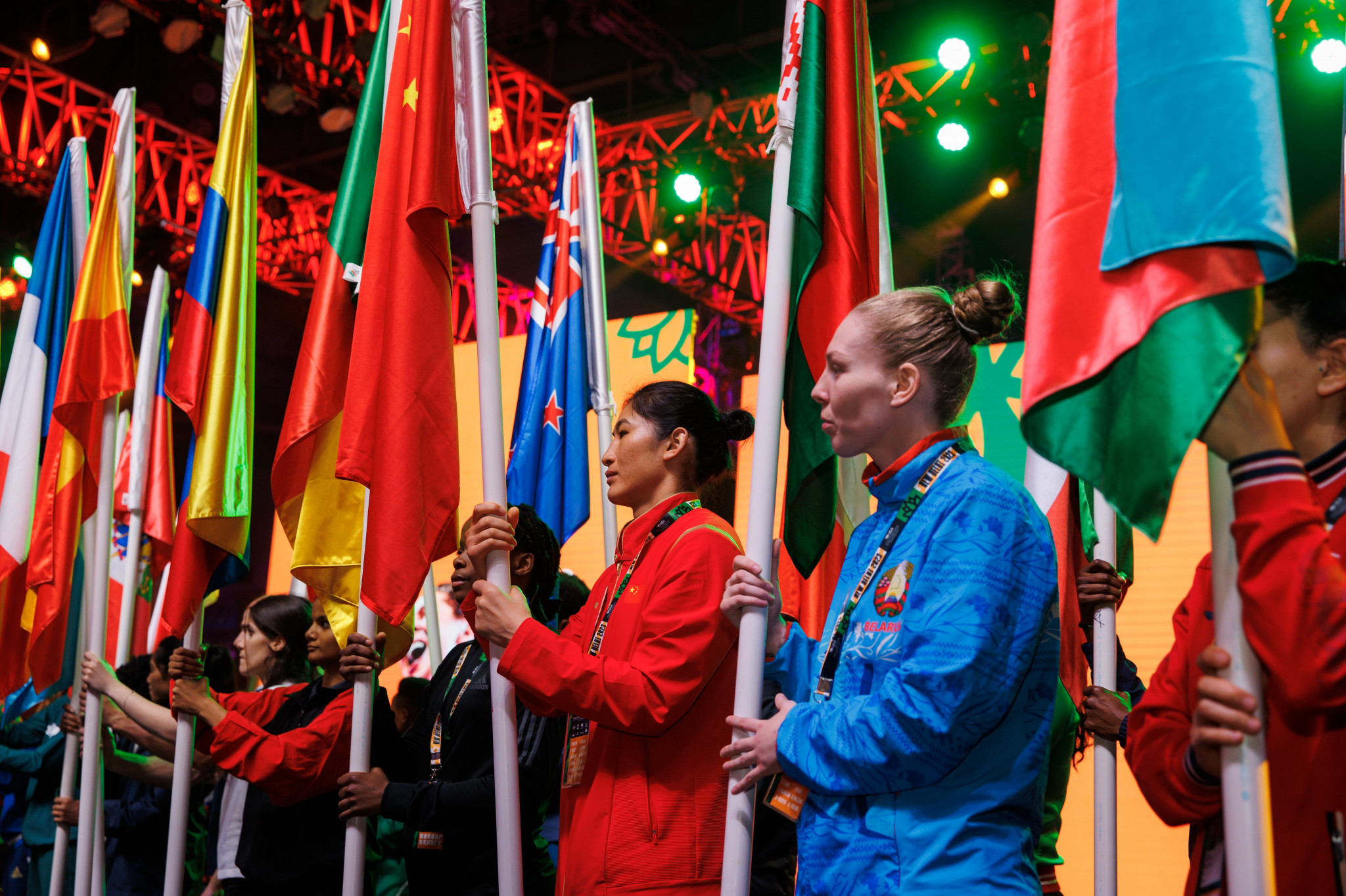 Alina Veber, second from right, carried the Belarus flag as Russian and Belarusian athletes got the chance to wear national symbols after the IBA lifted restrictions ©IBA