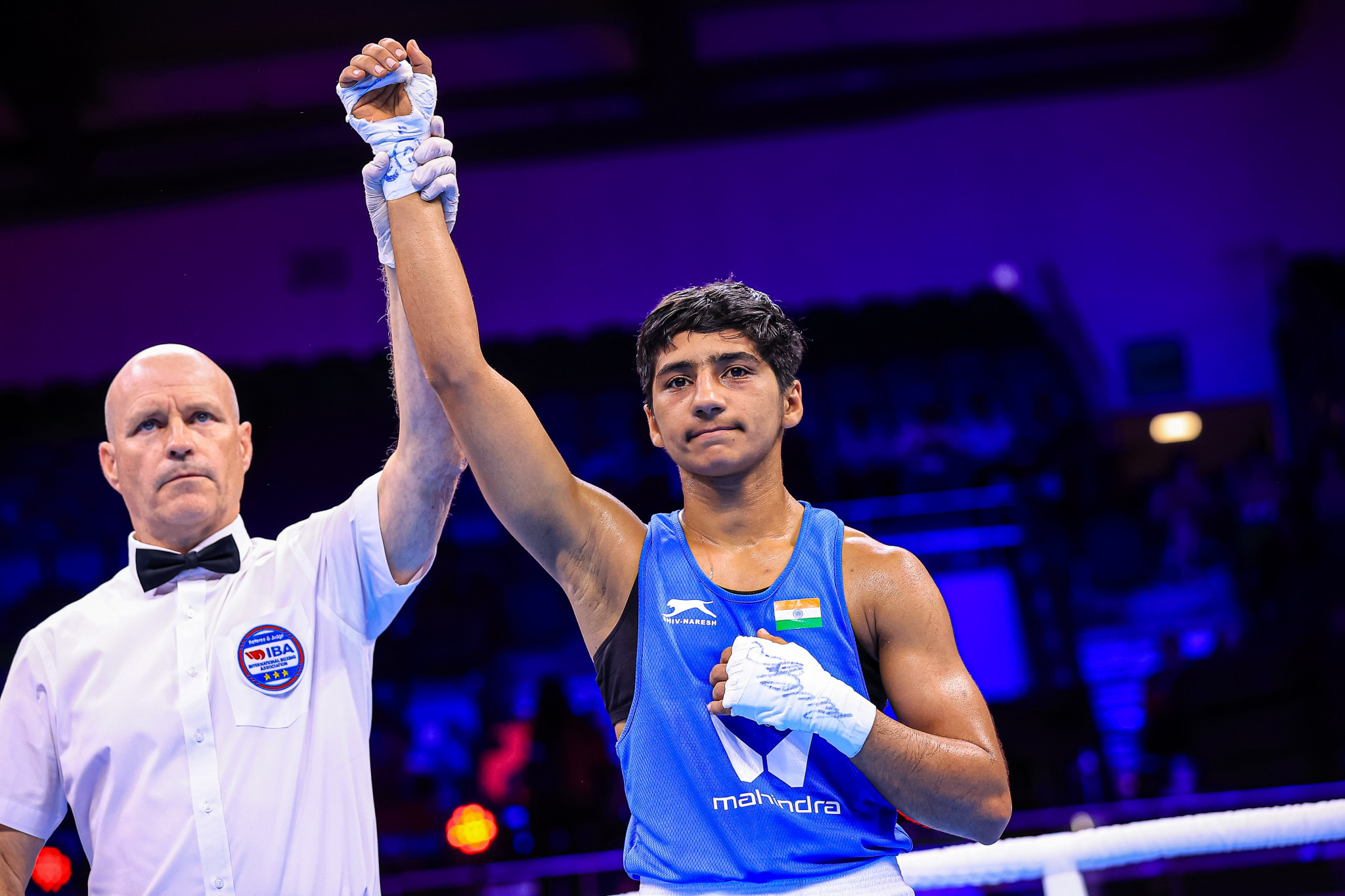 The referee raises the arm of Preeti who ensured four successive wins for India with her bantamweight triumph ©IBA