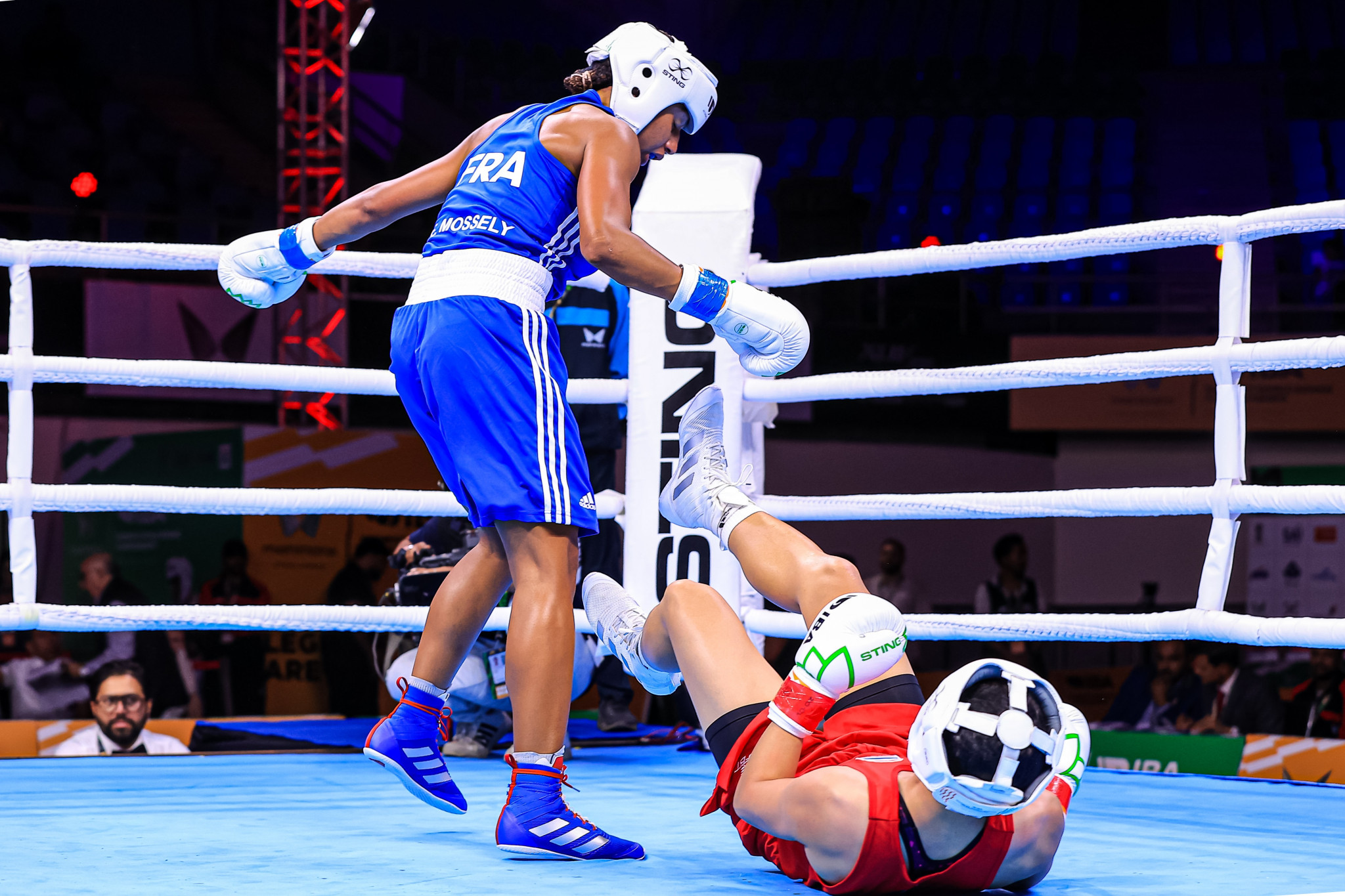 Thailand's Porntip Buapa takes a tumble as France's Olympic champion Estelle Mossely marked her return to amateur action with victory ©IBA