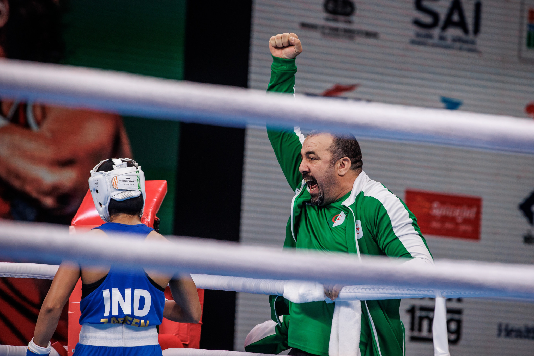 An Algerian coach celebrates at the end of the fight between Rousmaysa Boualam and India's Nikhat Zareen only to be left angered when the result did not go his way ©IBA