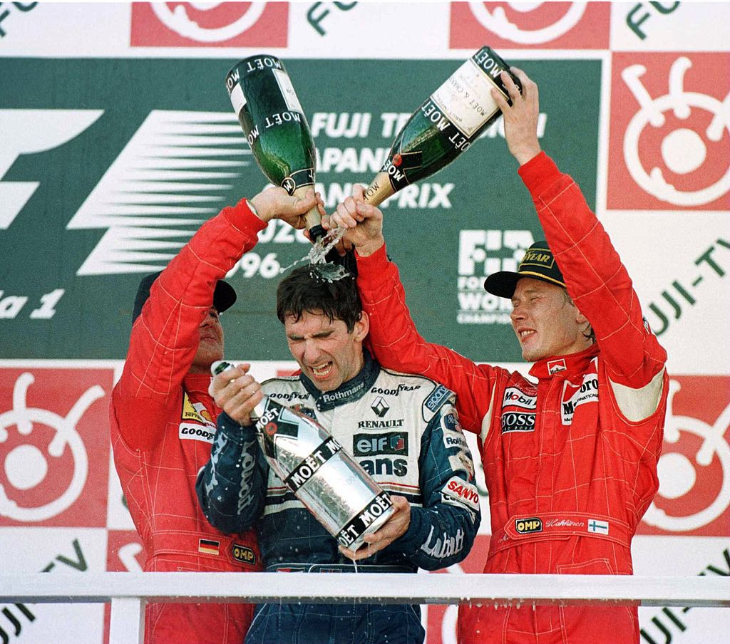 Britain's Damon Hill, whose father Graham won two F1 titles, celebrates his own in 1996 ©Getty Images