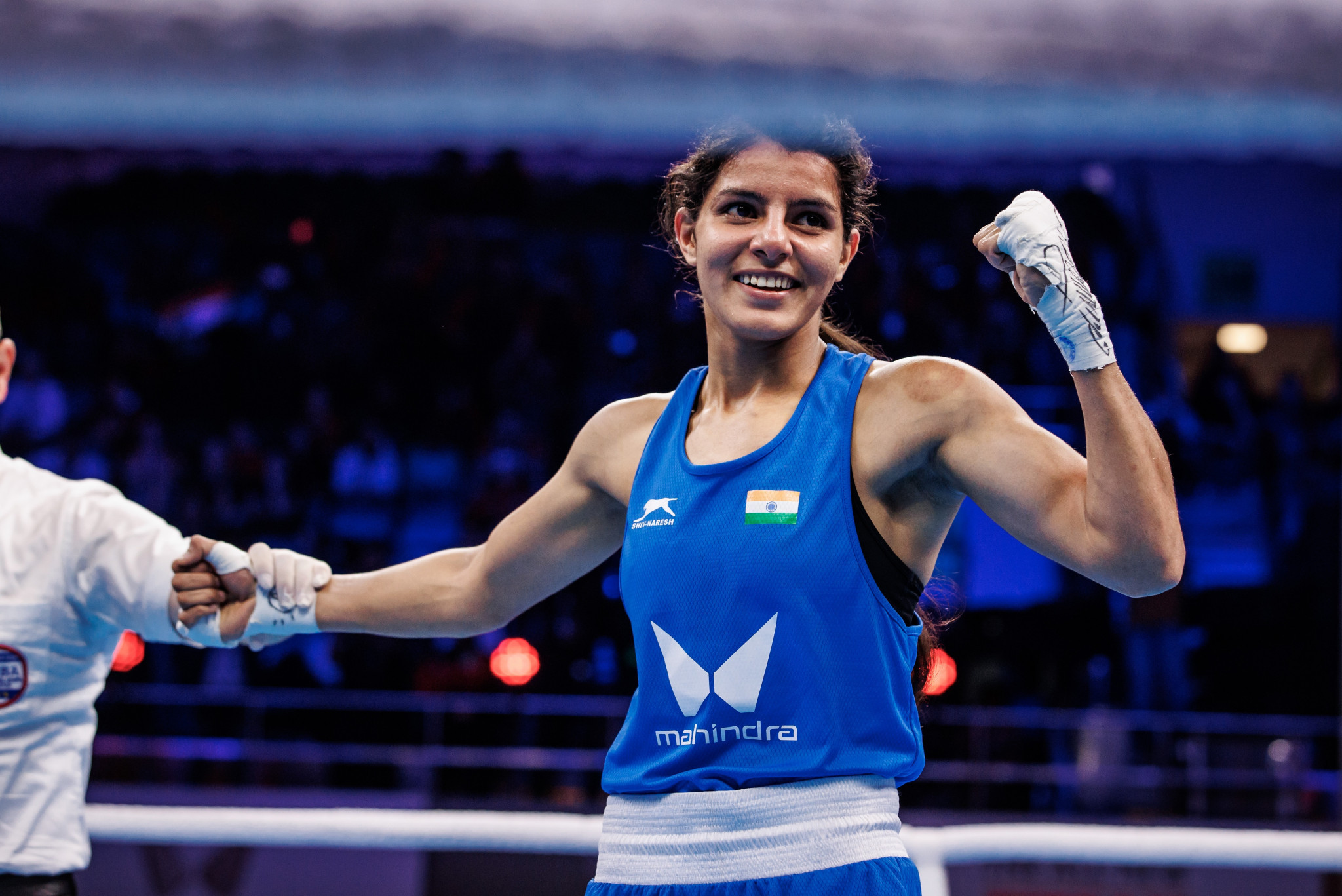 Sakshi celebrates after seeing off Uzbekistan’s fifth seed Zhazira Uraybayeva to reach the quarter-finals of the flyweight division ©IBA