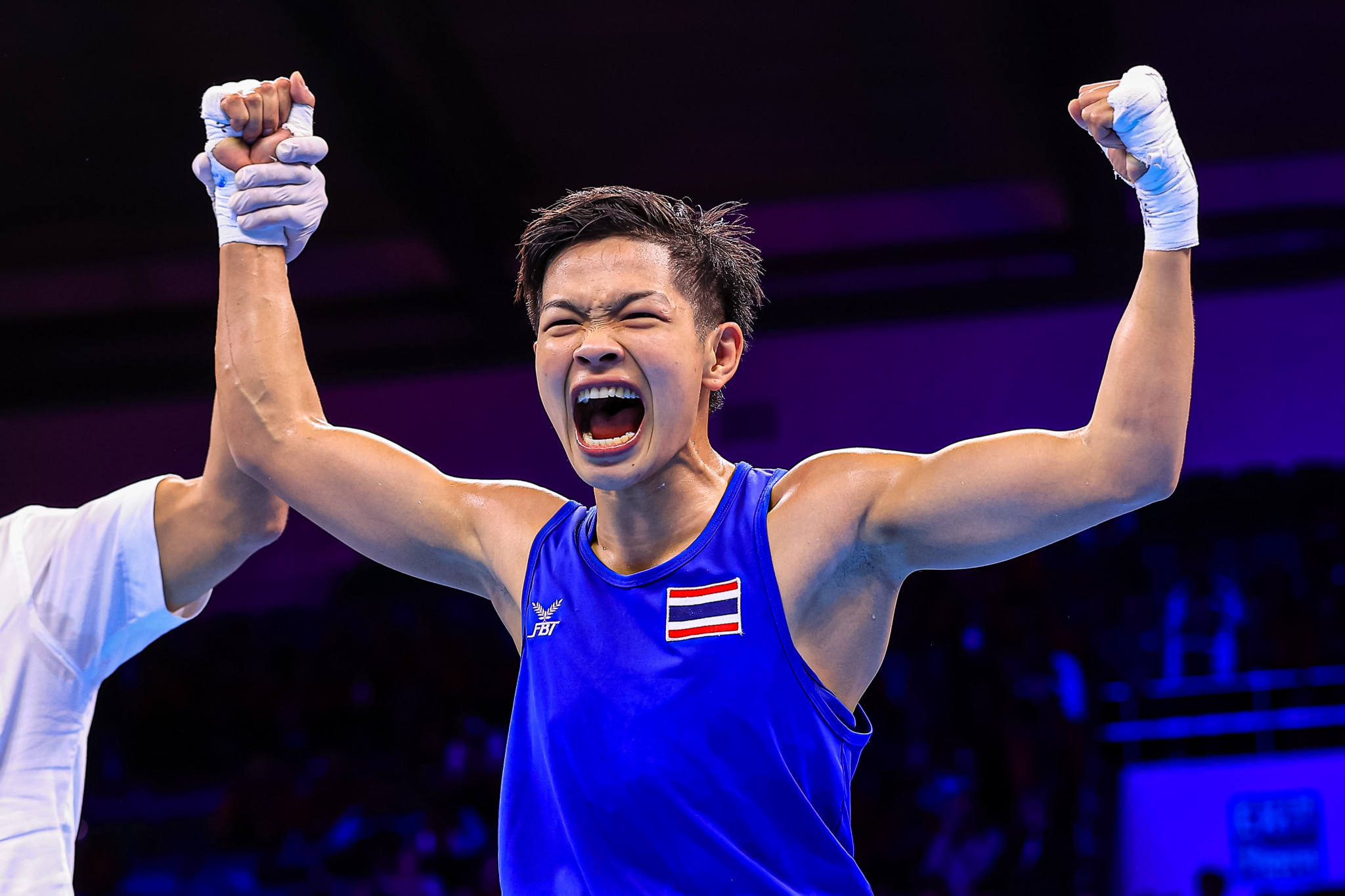 Thailand’s Jutamas Jitpong celebrates after beating home favourite Preeti in the light middleweight division ©IBA