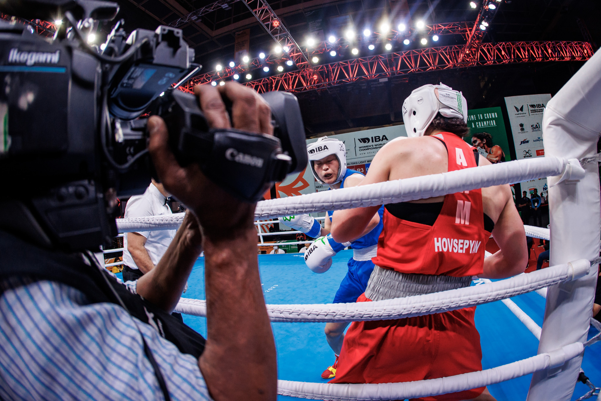 Armenia's top seed Ani Hovsepyan is forced on the ropes by Zhou Pan of China during her shock defeat in the light middleweight category ©IBA