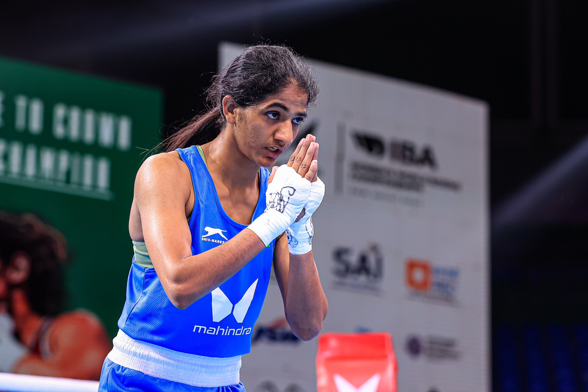 India's Nitu acknowledges the crowd after her minimumweight victory over Sumaiya Qosimova of Tajikistan ©IBA