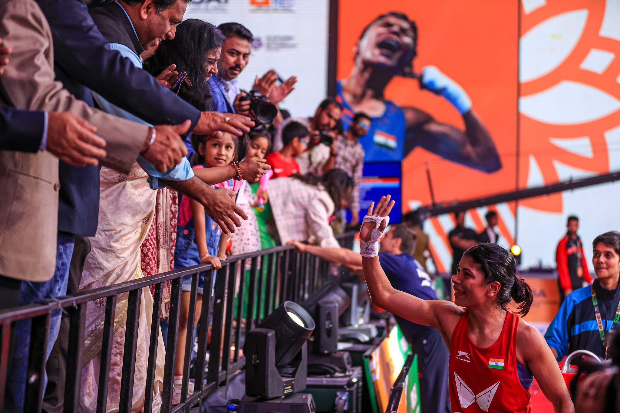 Nikhat Zareen of India interacts with the crowd after sealing her place in the light flyweight semi-finals ©IBA