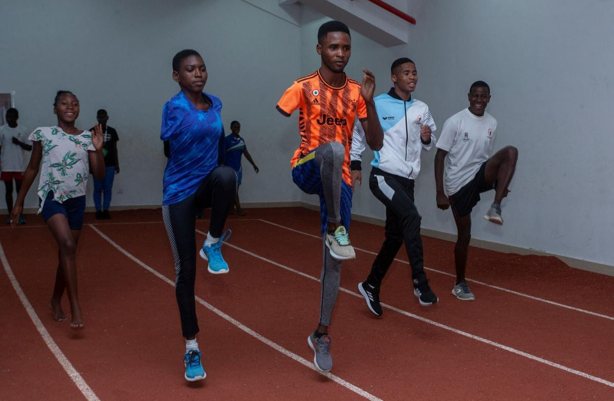 Sprinter Amos Ahiagah, pictured in the orange shirt, trains in the mornings at the Accra stadium as he plans to make his mark at the African Para Games it will host this year ©Amos Gumulira