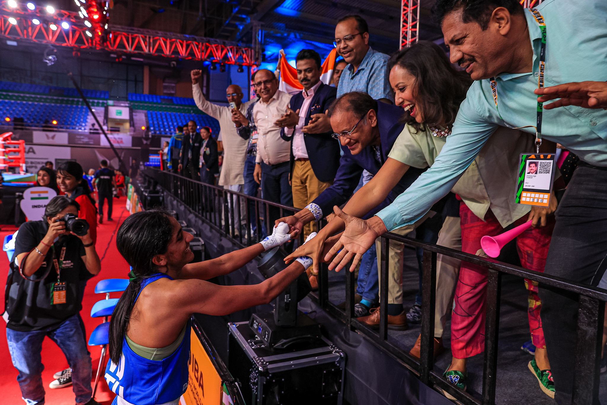 Nitu celebrates with the crowd after become the first of four Indian semi-final winners ©IBA