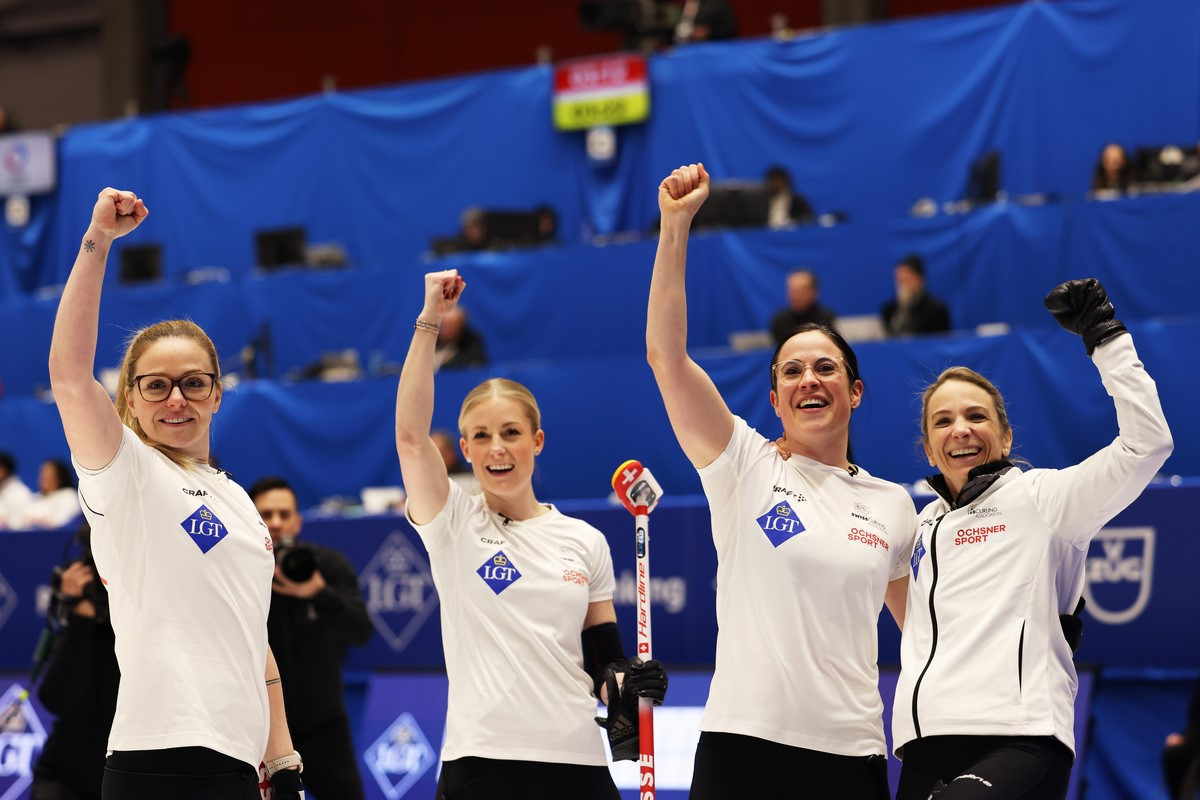 Switzerland celebrate after extending their winning streak at the World Women's Curling Championship to 34 matches, booking themselves a place in this year's final ©WCF/Stephen Fisher