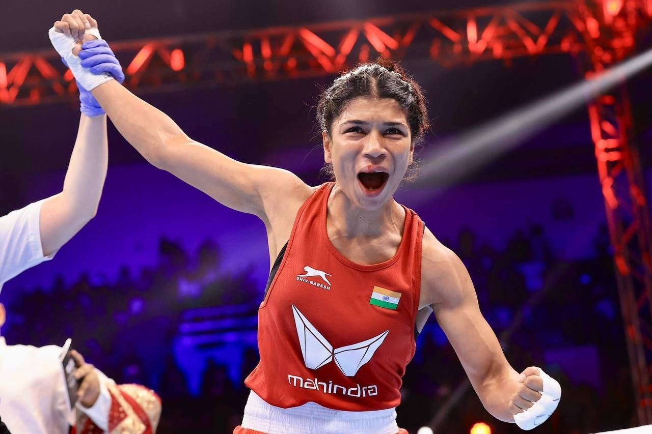 India's Nikhat Zareen celebrates after winning the light flyweight title in New Delhi ©IBA