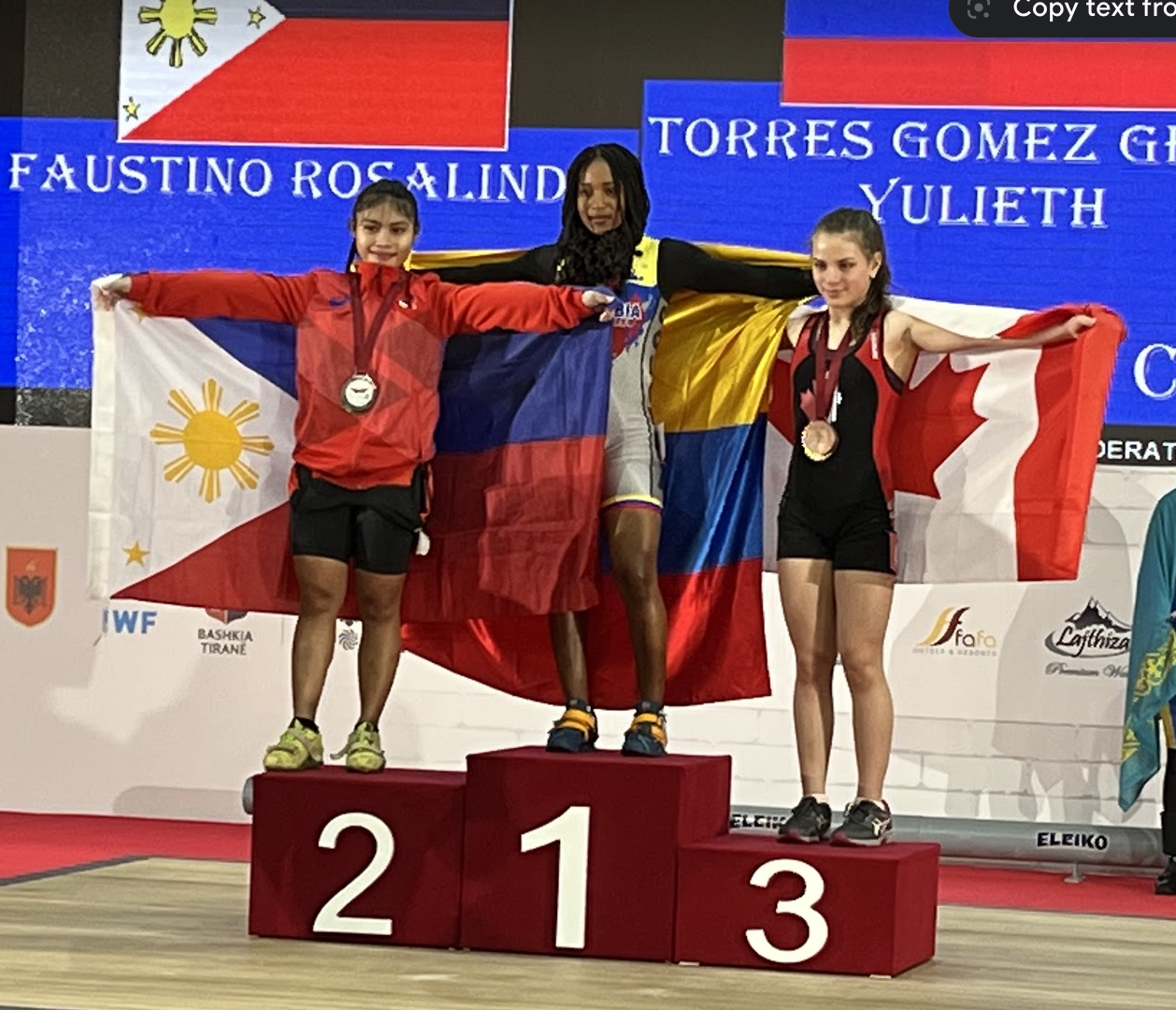 Emily Ibanez Guerrero, right, became weightlifting's youngest ever medallist ©ITG
