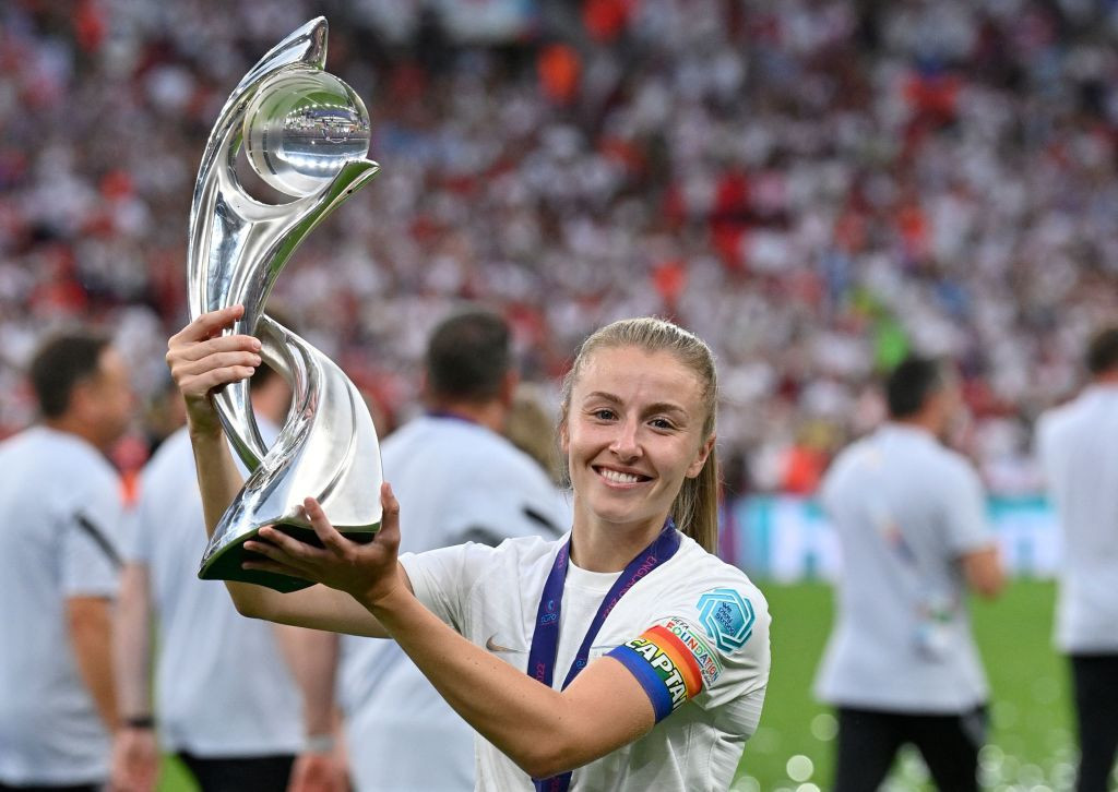 England's captain Leah Williamson, wearing a rainbow armband, lifts the UEFA Women's Euro 2022 trophy ©Getty Images