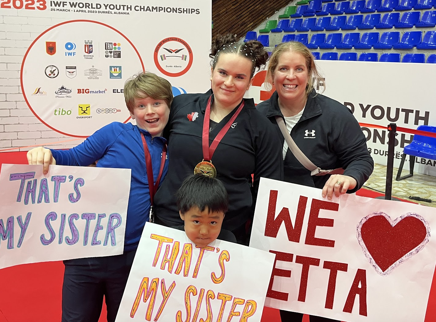 Emma Love, centre, carried on Canada's impressive showing at the IWF World Youth Championships in Durres with a silver medal in the women's 81kg ©ITG