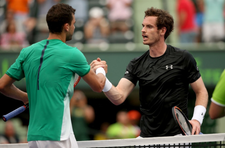 Andy Murray congratulates Grigor Dmitrov after losing his third round match at the Miami Open this week. Sleepless nights taking their toll?...©Getty Images