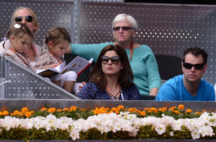 Roger Federer's twin girls Myla Rose and Charlene Riva widen their horizons while watching daddy play a match at the Madrid Open in 2013, with mother Mirka keeping her eye on the action ©Getty Images