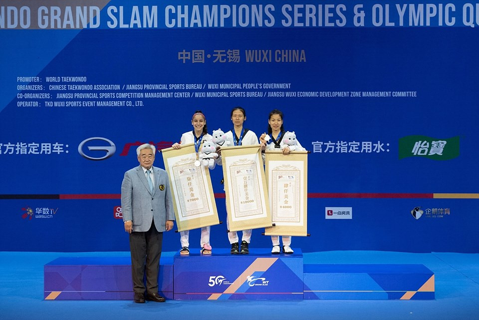 Zuo Ju of China, centre on podium, triumphed in the women's under-49kg at the World Taekwondo Grand Slam Champions Series Final ©World Taekwondo