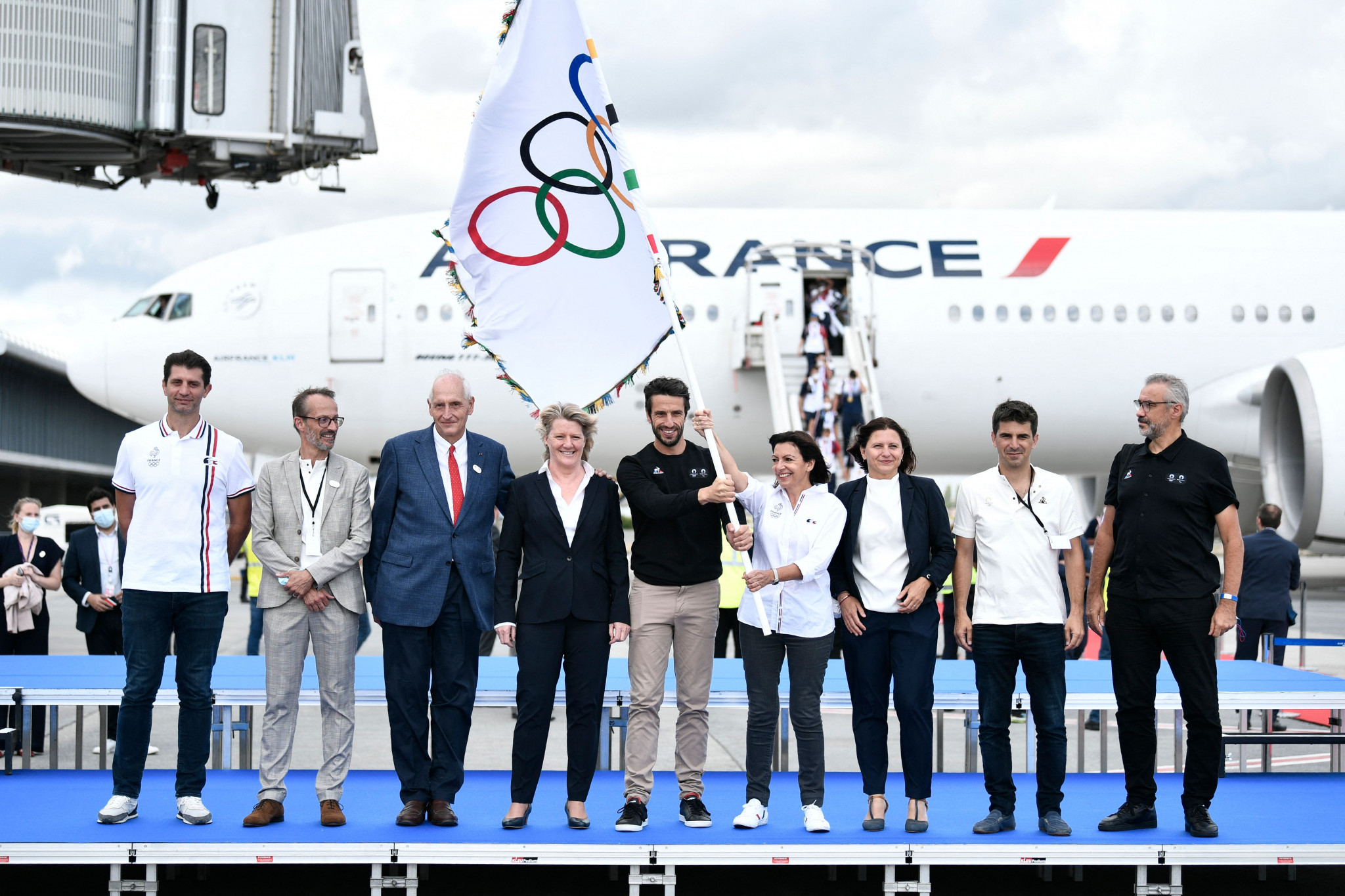 Brigitte Henriques, fourth left, was elected CNOSF President in 2021 shortly before the ceremonial Olympic Flag was handed over to Paris ©Getty Images