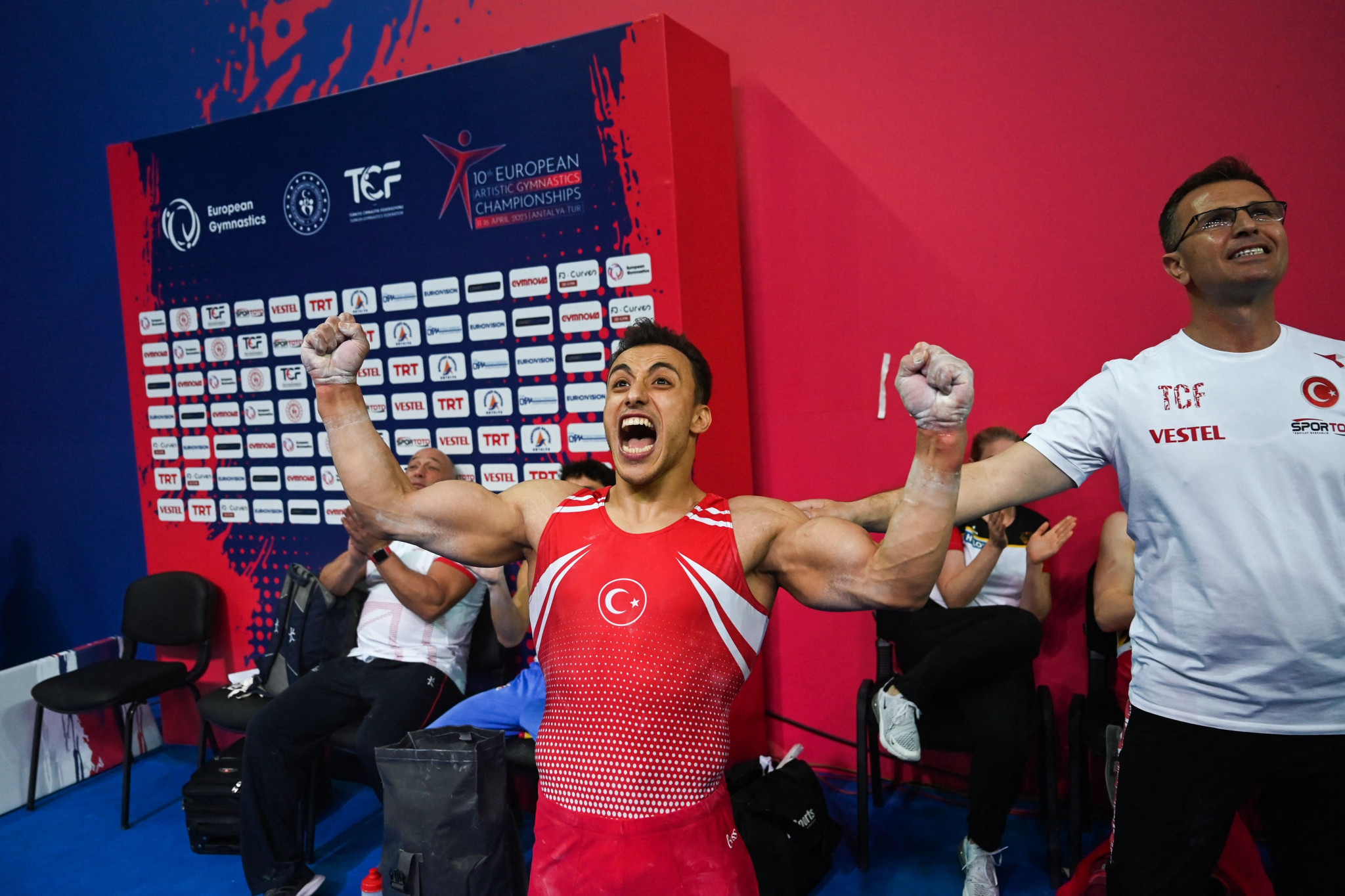 Turkey's Adem Asil celebrates after winning the men's all-around title at the European Artistic Gymnastics Championships in Antalya ©Getty Images