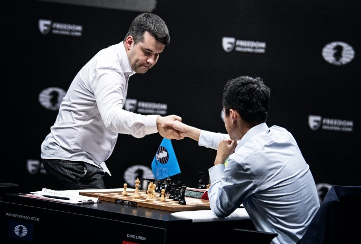 Ian Nepomniachtchi proved too strong for Ding Liren in game five in Astana ©FIDE